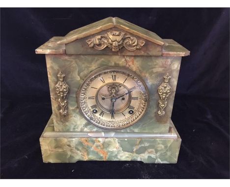 A marble mantle clock 