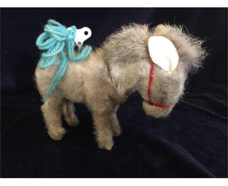 1950 automaton donkey with a wagging tail and nodding head