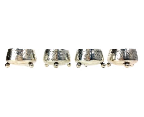 SET OF FOUR VICTORIAN SILVER SALT CELLARS, maker William Hutton &amp; Sons, London marks, each circular bowl with floral engr