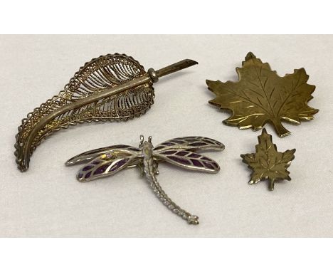 4 vintage and modern silver brooches.  Comprising: silver gilt maple leaf, a small maple leaf, a filigree style leaf and a dr