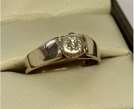 A vintage 9ct gold illusion set solitaire diamond ring.  Size M½.  Total weight 2.6g.