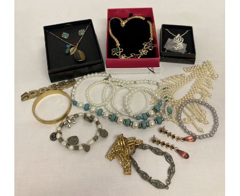 A small collection of vintage and modern costume jewellery.  To include an 800 silver bracelet set with turquoise and a fresh