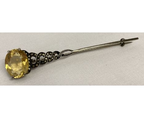 A vintage white metal twist stem brooch set with a large citrine and marcasite stones.  Large oval cut citrine measures appro
