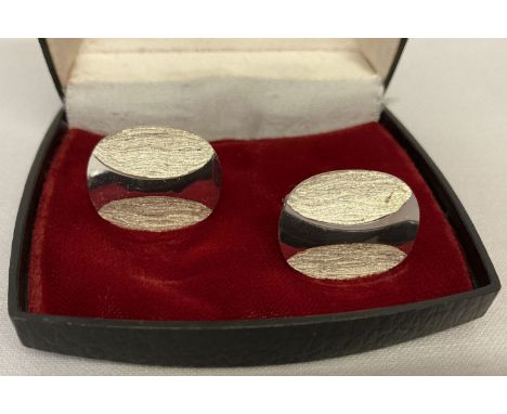 A boxed pair of West German silver vintage style cufflinks. Marked 925 W.Germany.  With brushed silver detail. 