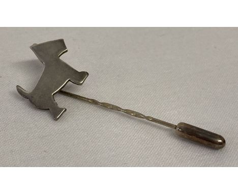 A silver Highland Terrier dog stick pin.   Approx. 5cm long.