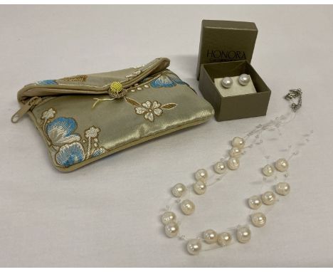 A pair of Honora pearl stud earrings together with a modern triple string freshwater pearl necklace.  Boxed earrings complete