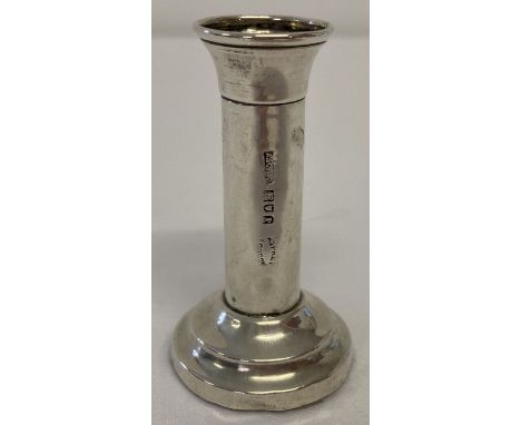 An antique silver miniature candlestick by Asprey &amp; Co, London.  Hallmarked London, 1910 with Asprey makers mark. Total h