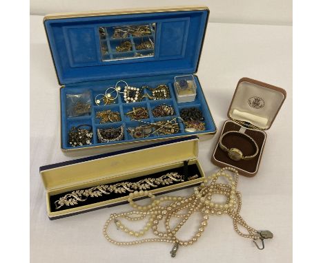 A small vintage jewellery box with interior compartments containing a collection of vintage costume  jewellery. To include di