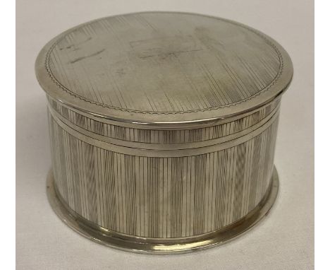 An early 20th century, Tuck Chang Shanghai silver circular lidded pot with engine turned detail.  Empty rectangular shaped ca