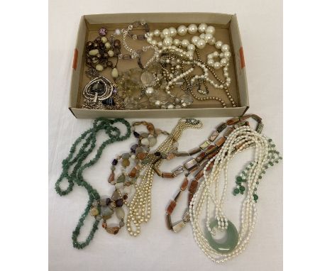 A box of natural stone, faux pearl and modern costume jewellery necklaces.  To include natural agate bead necklace, natural s