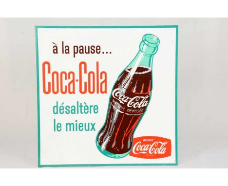 Two-sided metal Coca-Cola sign in FrenchThis two-sided Coca-Cola sign is in French and has a side mounting bracket with 5 mou