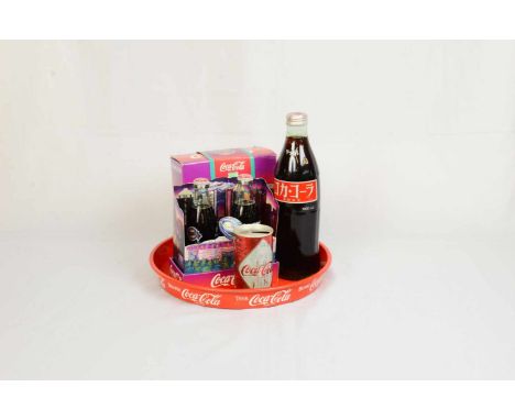 Set of 4 Coca-Cola itemsThis set of 4 Coca-Cola items contains - Coca-Cola tray in average condition, scratches and missing c