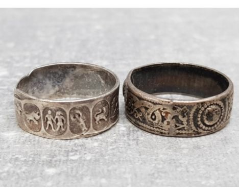 2 SILVER BAND RINGS - ONE CELTIC DESIGN THE OTHER WITH THE SIGNS OF THE ZODIAC, 7.6G TOTAL WEIGHT