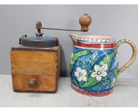 PEUGEOT STYLE COFFEE GRINDER TOGETHER WITH A STUDIO POTTERY JUG WITH TEST GLAZES ON IT AND SIGNED WITH SWASTIKA TO BASE