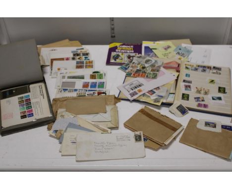 A job lot of first day covers and stamp albums 