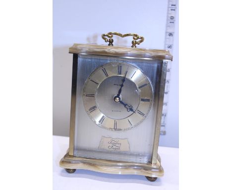 A Oynx and glass cased mantle clock 