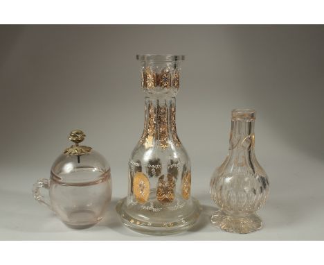 TWO 19TH CENTURY OTTOMAN MARKET GILDED GLASS HUQQA BASES, and another 19th century Ottoman Turkish lidded cup with brass flow