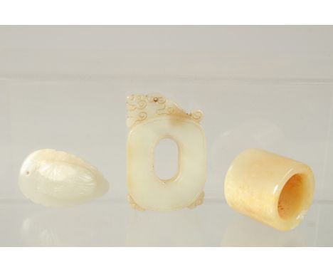 A FINE CHINESE CARVED WHITE JADE PENDANT, together with an archers ring and a carved moth pendant, (3).