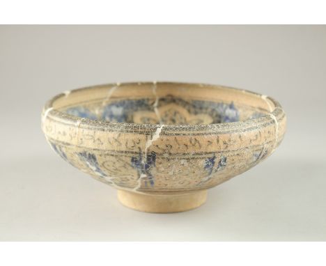 A FINE 13TH-14TH CENTURY PERSIAN ILKHANID SULTANABAD GLAZED POTTERY BOWL, depicting a swan to the centre and calligraphy to t