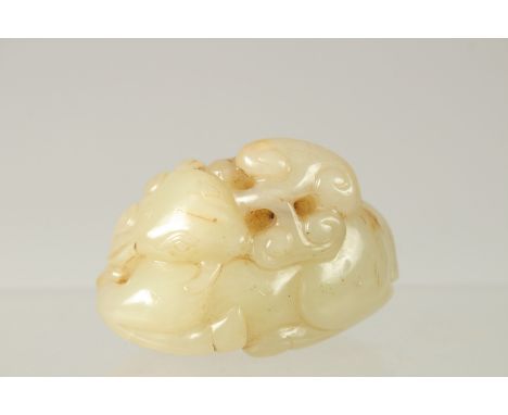 A 19TH CENTURY QING DYNASTY CHINESE CARVED JADE GOAT, 6cm long.