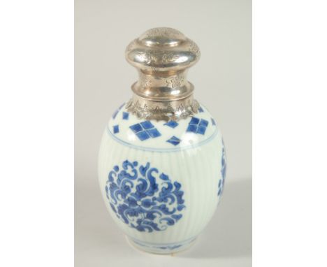 A CHINESE KANGXI BLUE AND WHITE PORCELAIN CADDY, with silver mounted lid, 19cm high.