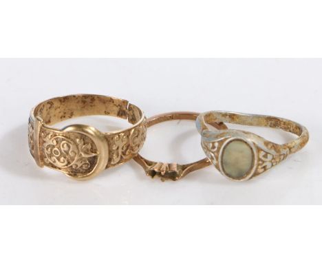 A pair of 9ct yellow gold broken rings and one silver ring with mother of pearl.9ct weighing 4.1 grams.Silver weighing 0.87 g