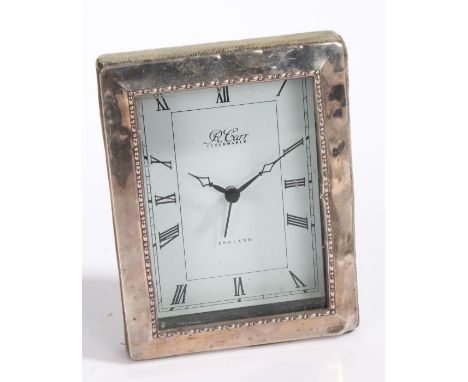 Elizabeth II silver mantel clock, Sheffield 1993, maker Harrods Ltd. with beaded border, the white dial with Roman numerals, 