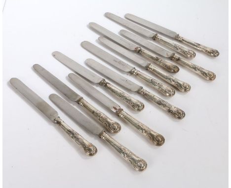 Set of twelve Victorian silver handled table knives, with kings pattern handles, the blades marked Harrison Brothers &amp; Ho