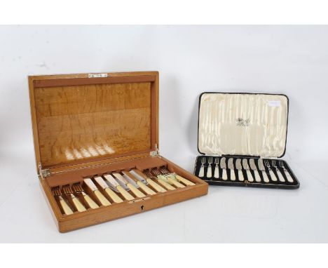 Set of six each silver bladed fish knives and forks, Sheffield 1936, John Sanderson &amp; Son Ltd., housed within an oak cant