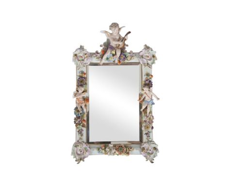 A SITZENDORF STYLE POLYCHROME PORCELAIN RECTANGULAR WALL MIRROR, with figure. 35 x 49cm