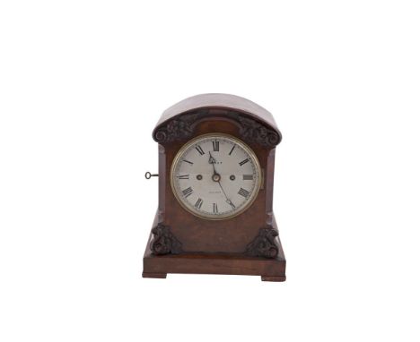 A GEORGE IV MAHOGANY CASED BRACKET CLOCK, by May, London, the domed top above a painted metal disc, the case decorated with c