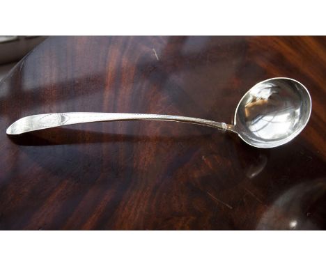 AN IRISH GEORGE III BRIGHT CUT ENGRAVED LADLE, Dublin 1798, mark of William Ward, crested, (c.186g). 35cm long