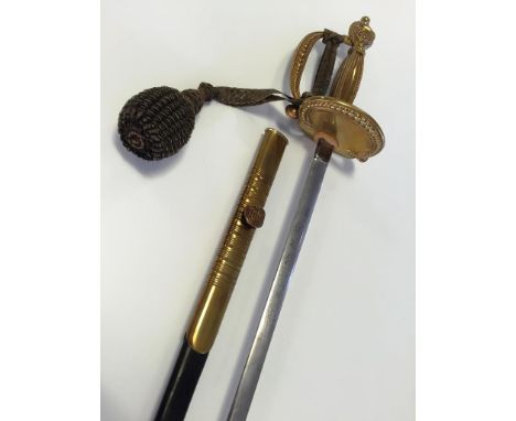 AN EDWARD VII DIPLOMATIC SWORD with leather and brass-mounted scabbard, engraved blade