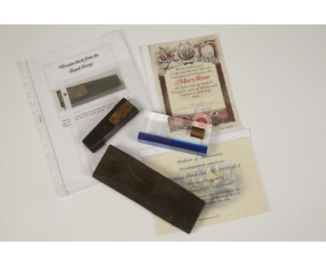 A PIECE OF TIMBER FROM THE MARY ROSE, a wooden block from the Royal George, and a growing block from the Royal Navy's First I