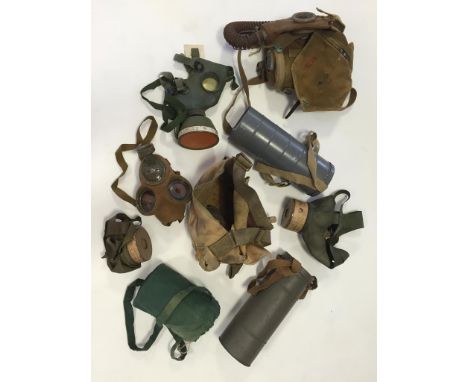 A COLLECTION OF SECOND WORLD WAR GAS MASKS, Japanese, Belgian, Dutch and others, Army and civilian issues.