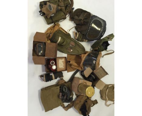 A COLLECTION OF SECOND WORLD WAR BRITISH GAS MASKS, civilian and army issues, various types including asthma, hospital, baby 