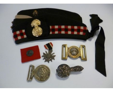 AN ENGRVED HON ARTILLERY COMPANY BUTTON, Nazi medal, and other items including a Scottish and East Surrey Regiment cap.