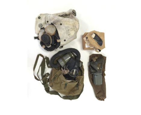 SECOND WORLD WAR AMERICAN GAS MASKS, Navy, Army and civilian issues, and one Canadian gas mask.