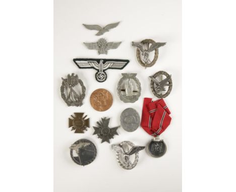 A COLLECTION OF GERMAN NAZI MEDALS AND BADGES, Luftwaffe, Navy, Army and others. (14)