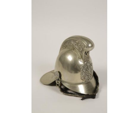 A VICTORIAN MERRYWEATHER FIRE HELMET, all nickel helmet with ornate high comb and National Fire Brigade Cross Axes crest, lea