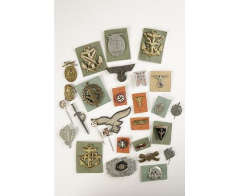 A COLLECTION OF GERMAN NAZI BADGES, including party badge, Women's Work, Naval, Army and others. 