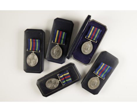 ELIZABETH II CIVIL DEFENCE LONG SERVICE MEDALS, one impressed (FIRST AID PARTY LEADER H.F.G. TREACHER READING) and four other