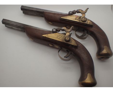 Pair of antique style good reproduction double barrel percussion cap pistols   CONDITION REPORT:  POSTAGE: There are Internat
