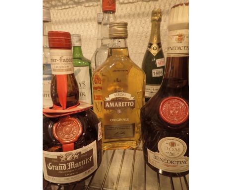 One bottle of Grand Marnier, one bottle of Benedictine and one bottle of Amaretto   CONDITION REPORT:  POSTAGE: There are res