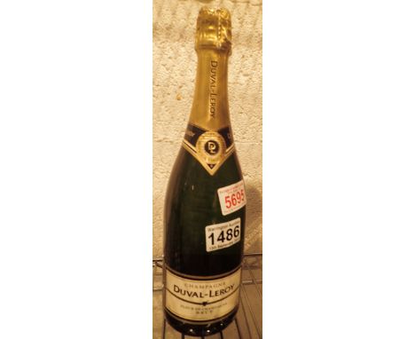 Bottle of Duval Leroy NV champagne   CONDITION REPORT:  POSTAGE: There are restrictions on the shipment of this item. If you 