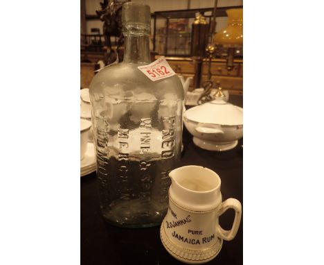 Fred Hirst Todmorden whisky water jug and a glass spirit bottle   CONDITION REPORT:  POSTAGE: There are restrictions on the s