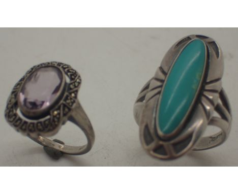 Two silver rings, one amethyst set and one turquoise