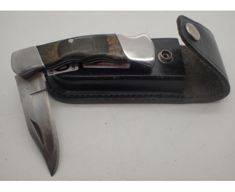 Good quality folding knife in leather sheath   CONDITION REPORT:  POSTAGE: There are International restrictions on the shipme