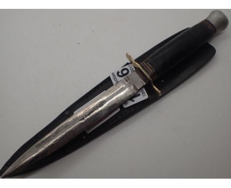 Vintage twin bladed commando style dagger in leather sheath    CONDITION REPORT:  POSTAGE: There are International restrictio