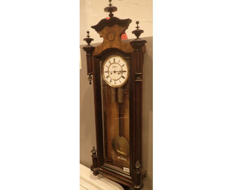 Good quality twin weight Vienna wall clock    CONDITION REPORT:  Item ticks for a few minutes and then stops, pendulum presen